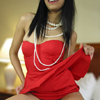 East Indian Asian escort girl in a red dress. 