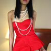 East Indian girl working as escort in toronto. she is wearing a red dress